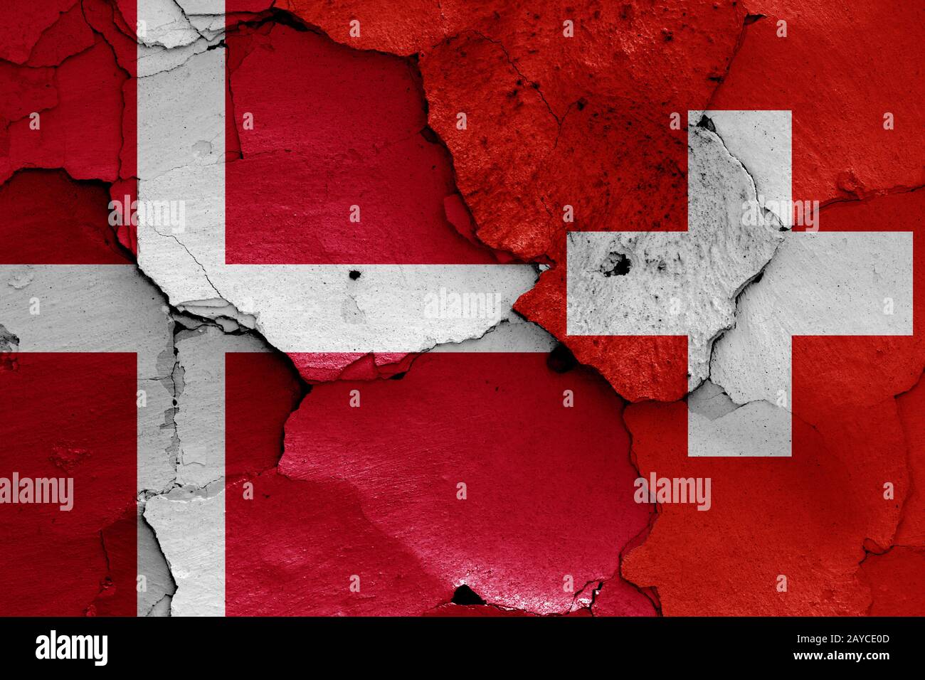 flags of Denmark and Switzerland painted on cracked wall Stock Photo ...