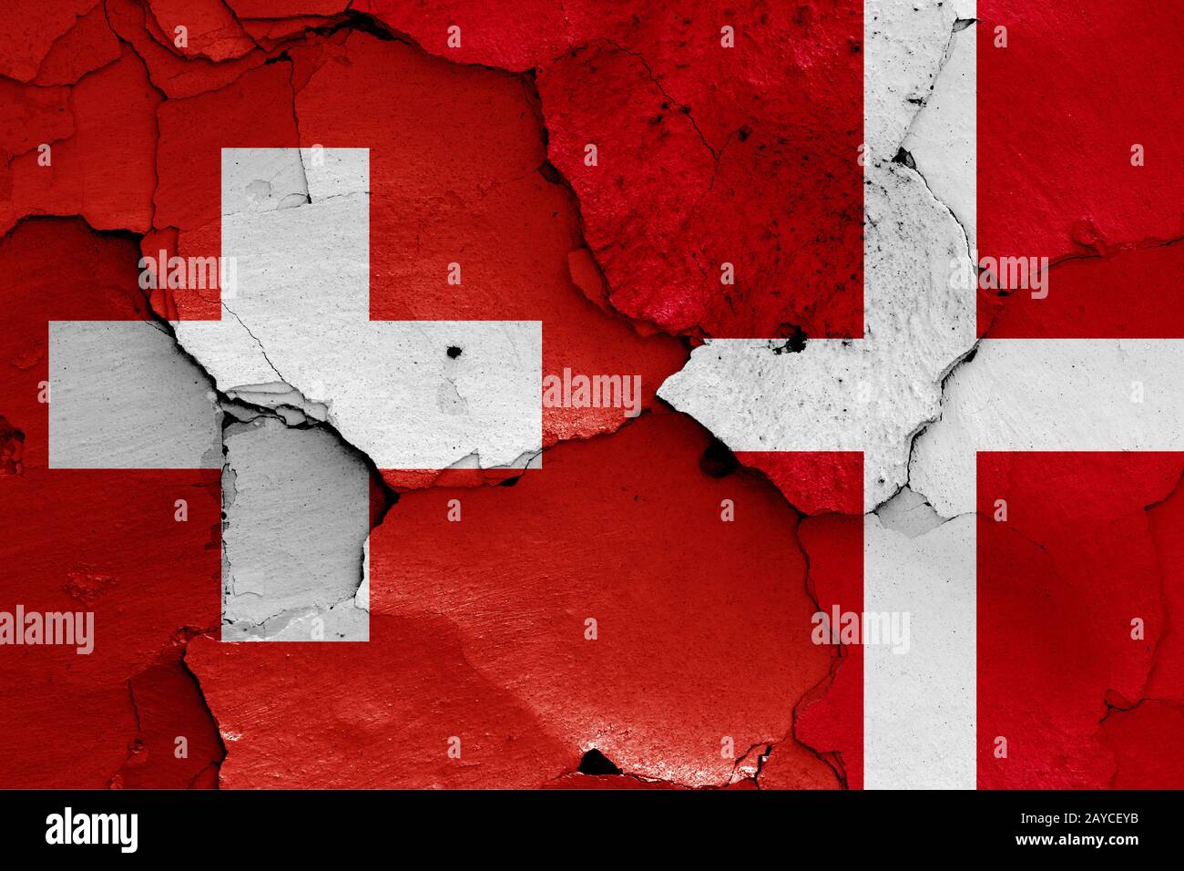 flags of Switzerland and Denmark painted on cracked wall Stock Photo ...