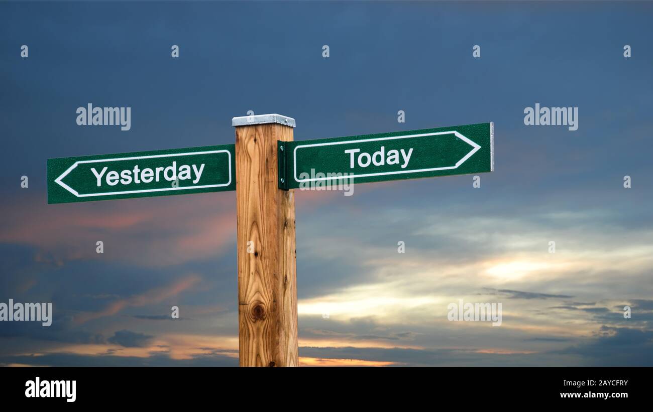 Wall Sign Today versus Yesterday Stock Photo - Alamy