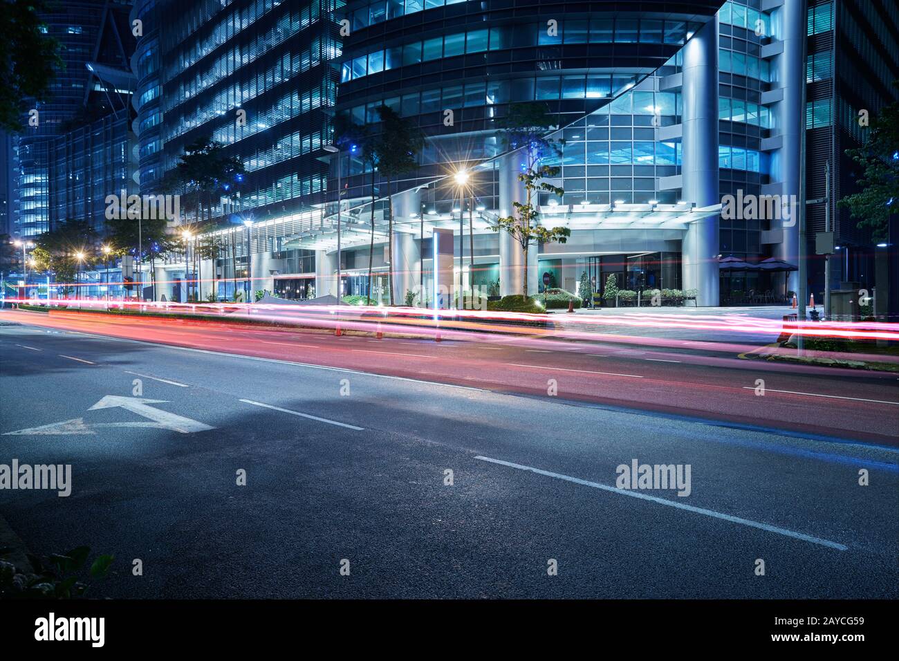 Modern building with light trails on night scene  background Stock Photo