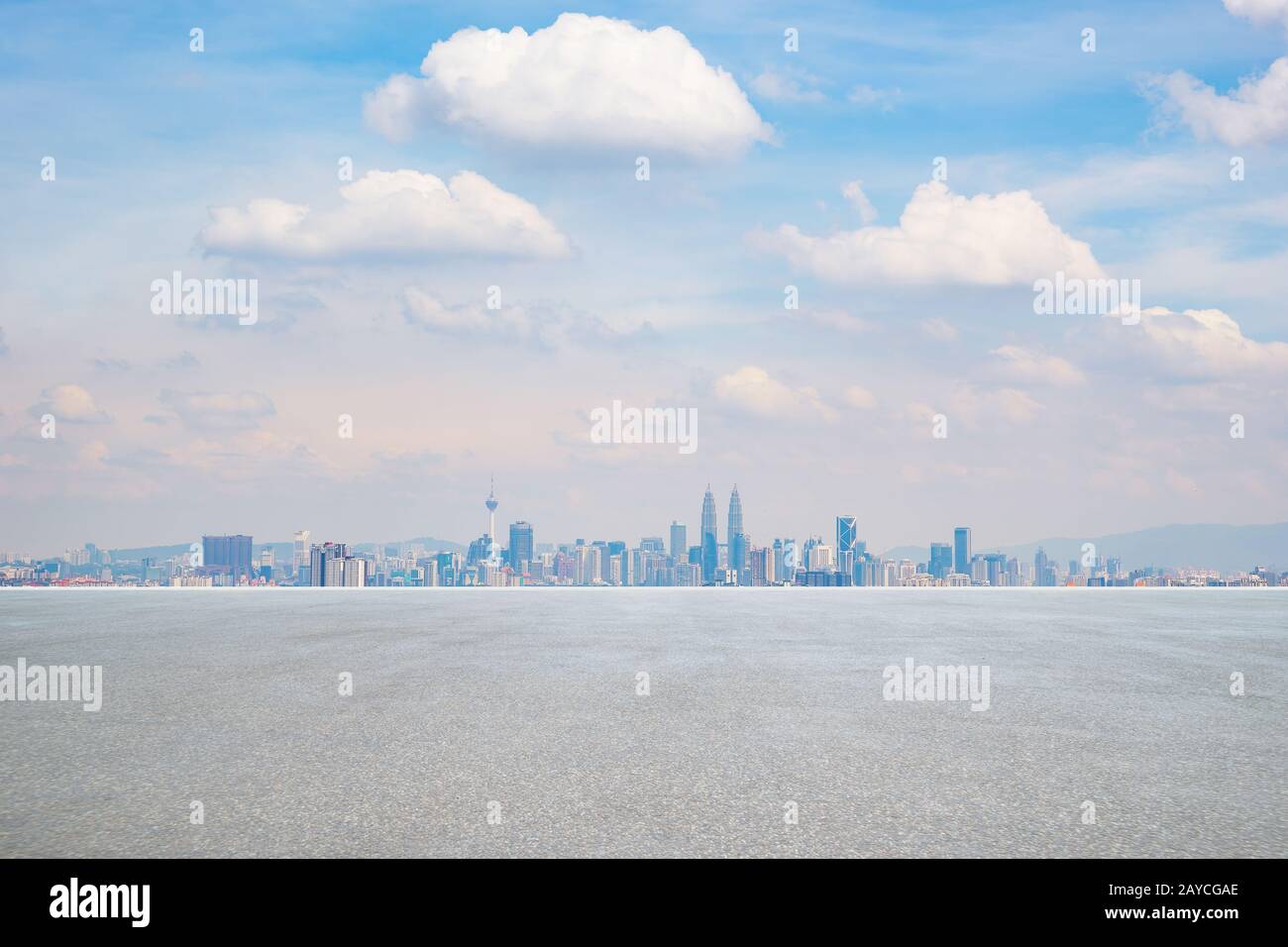 Panoramic city skyline  with empty concrete  floor . Stock Photo
