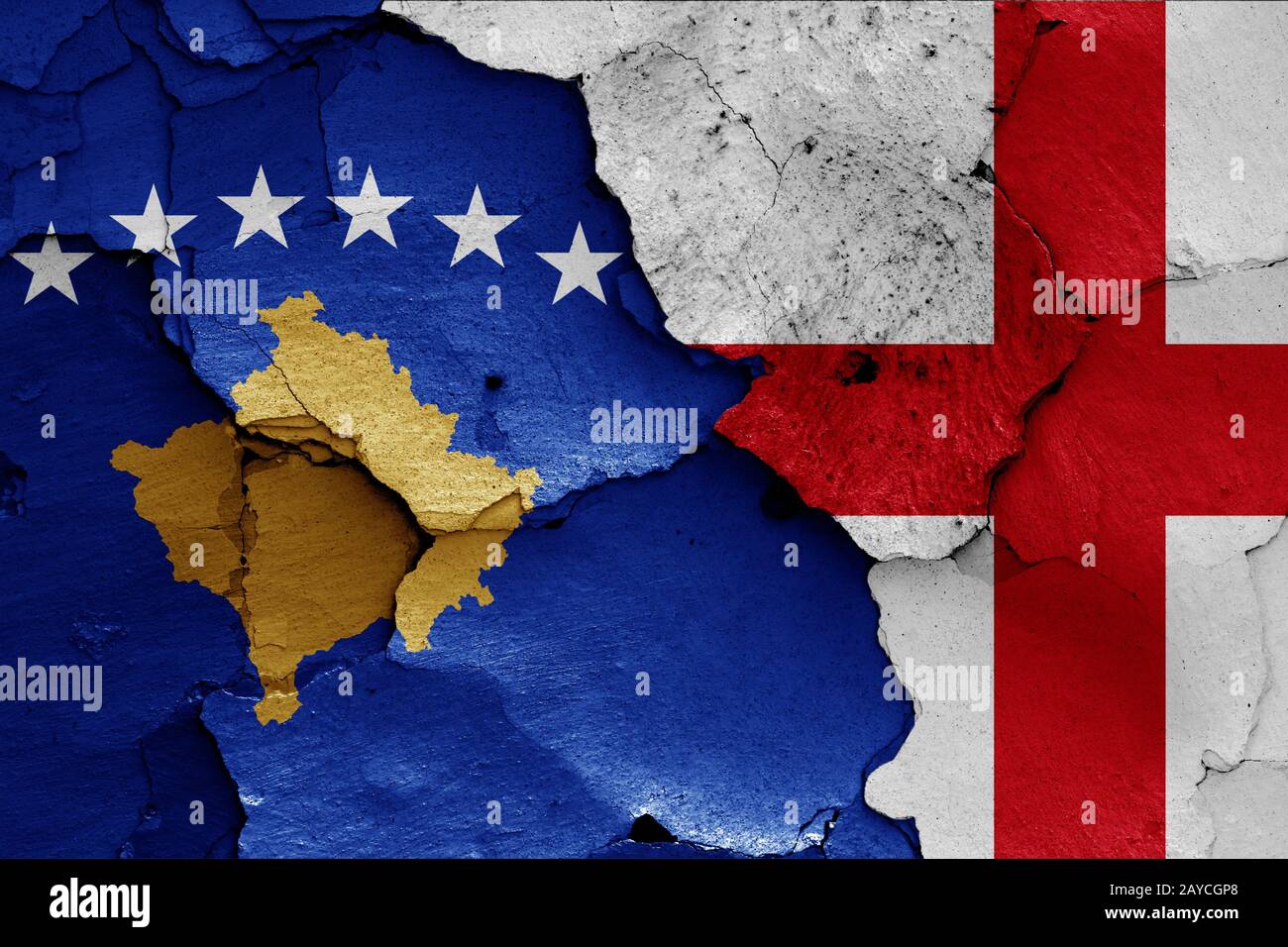 flags of Kosovo and England painted on cracked wall Stock Photo