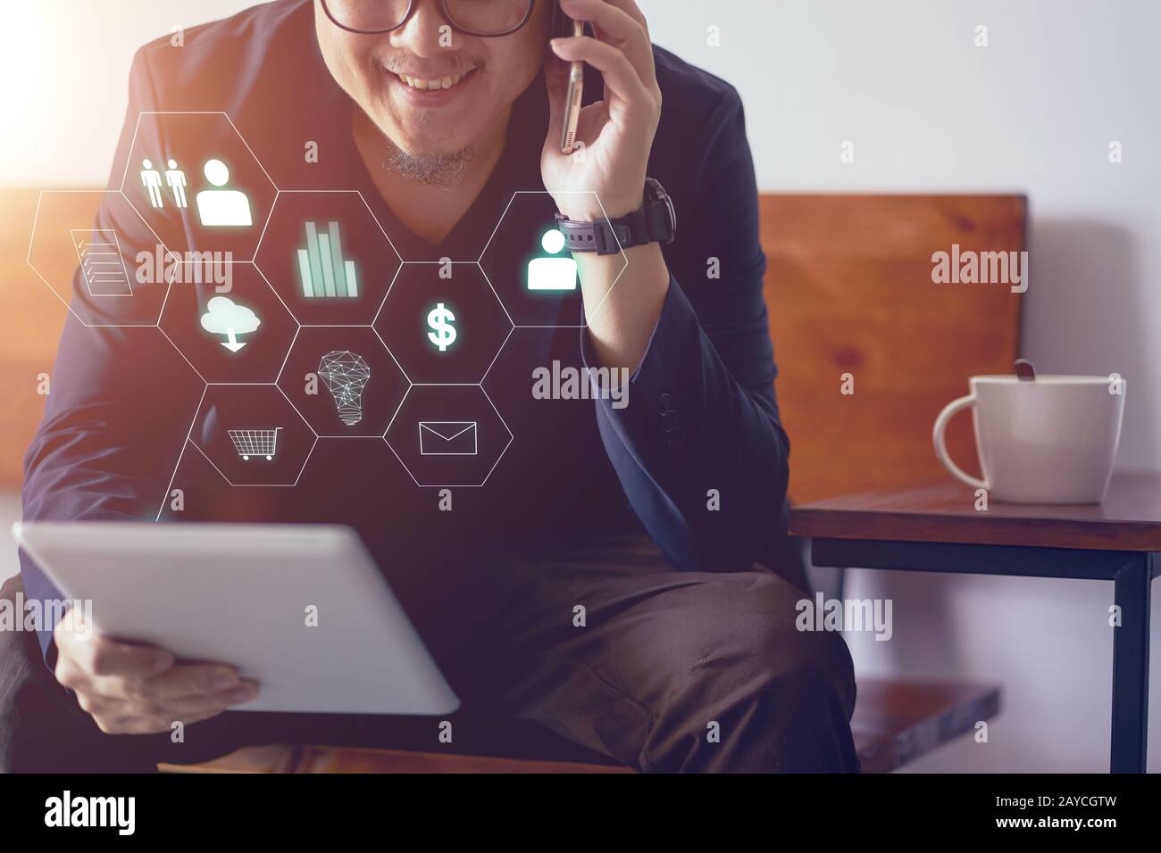 Man holding digital tablet making online shopping and banking payment. Blurred background . Stock Photo