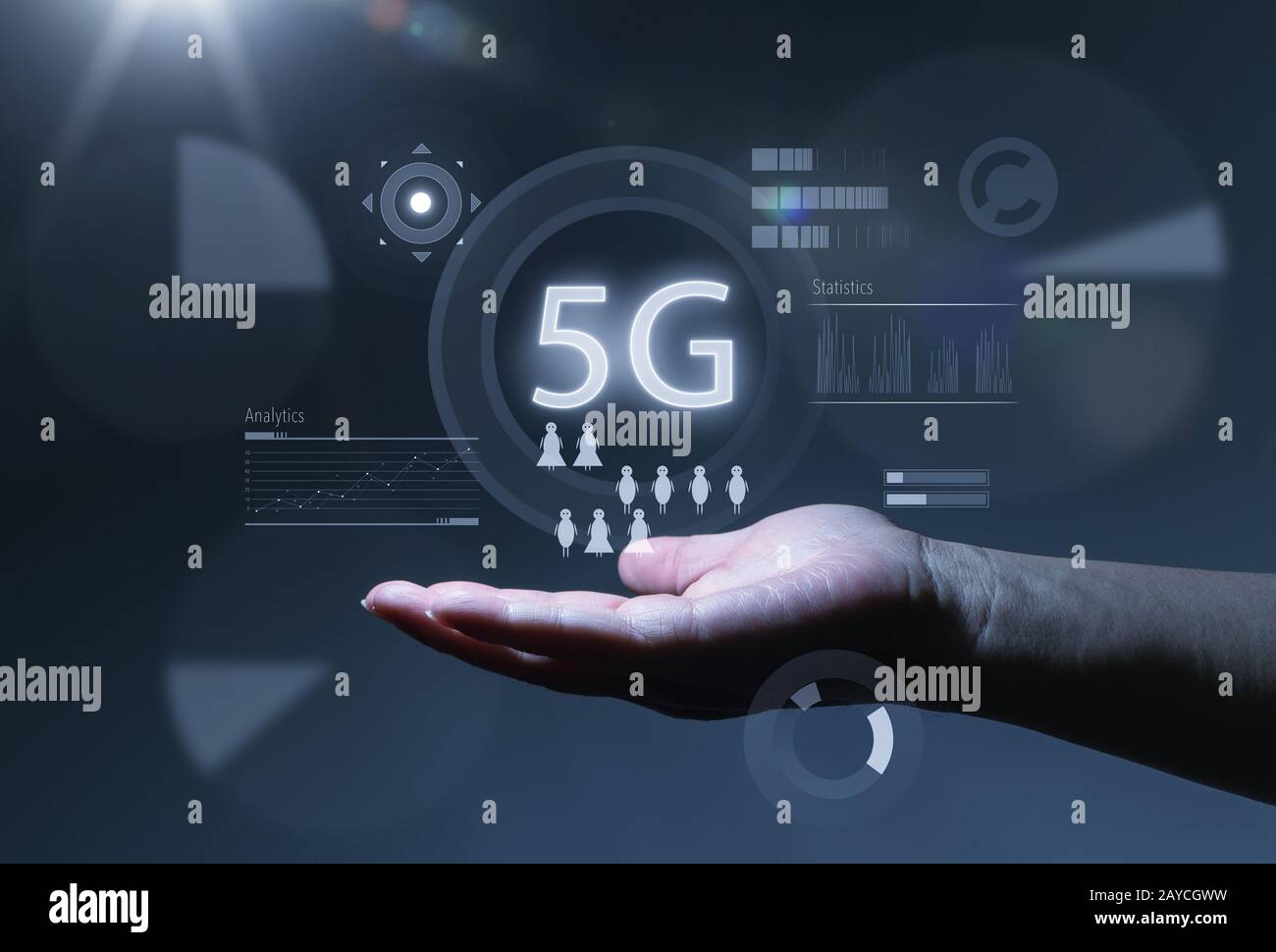 5G network wireless systems and internet of things with open palm hand gesture of male hand on dark background . Stock Photo