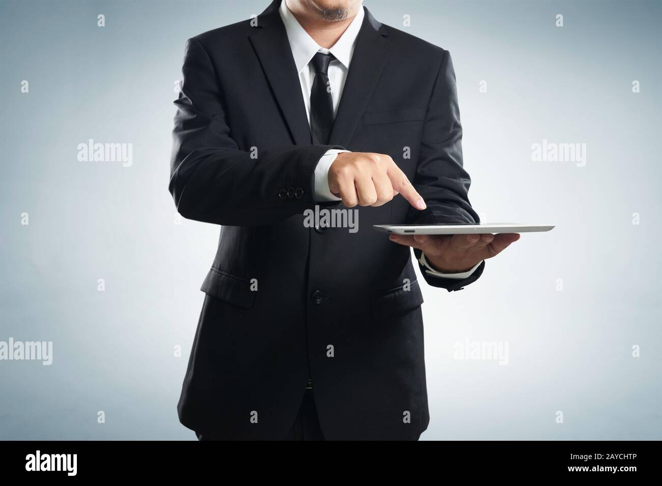 Businessman working on a digital tablet Stock Photo