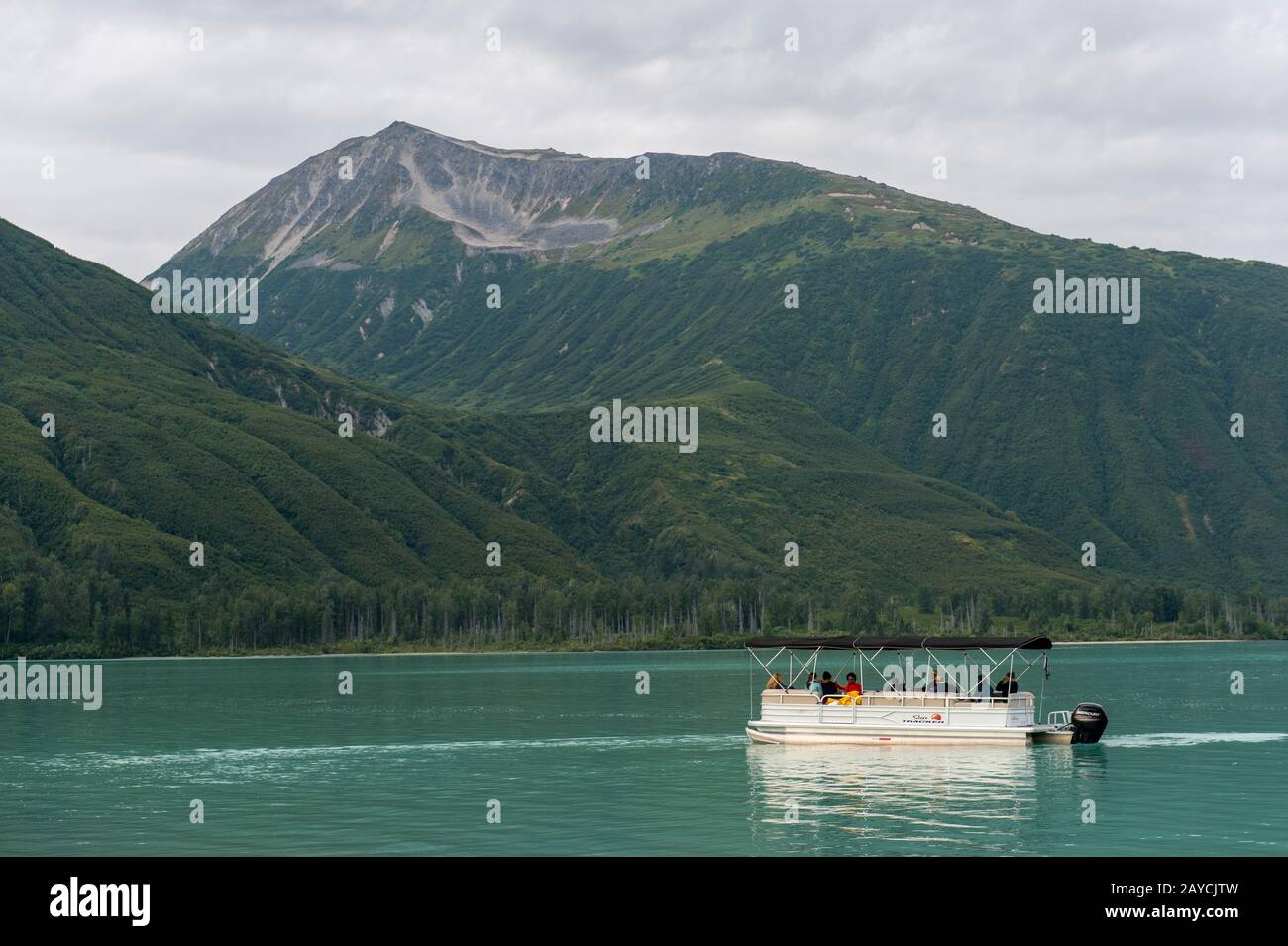 People in a boat on a day trip to see the brown bears at Lake Crescent in Lake Clark National Park and Preserve, Alaska, USA. Stock Photo