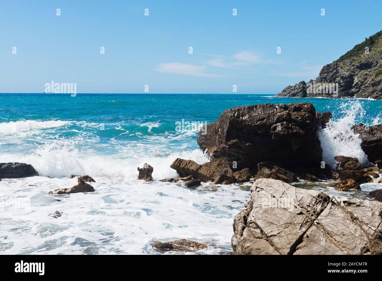 Beautiful azure sea and the rocky beach Stock Photo