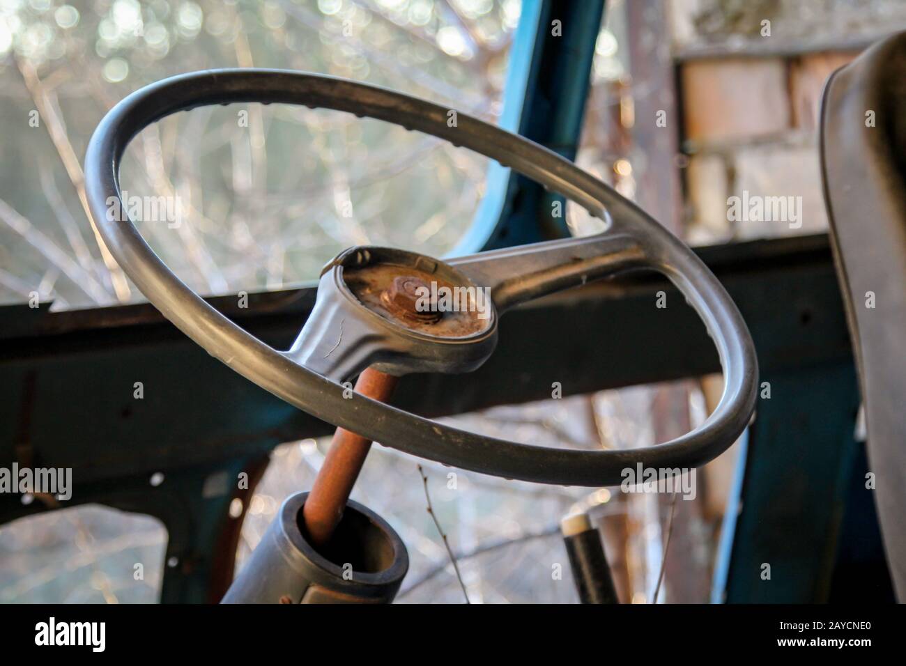 The steering wheel of an old destroyed truck Stock Photo