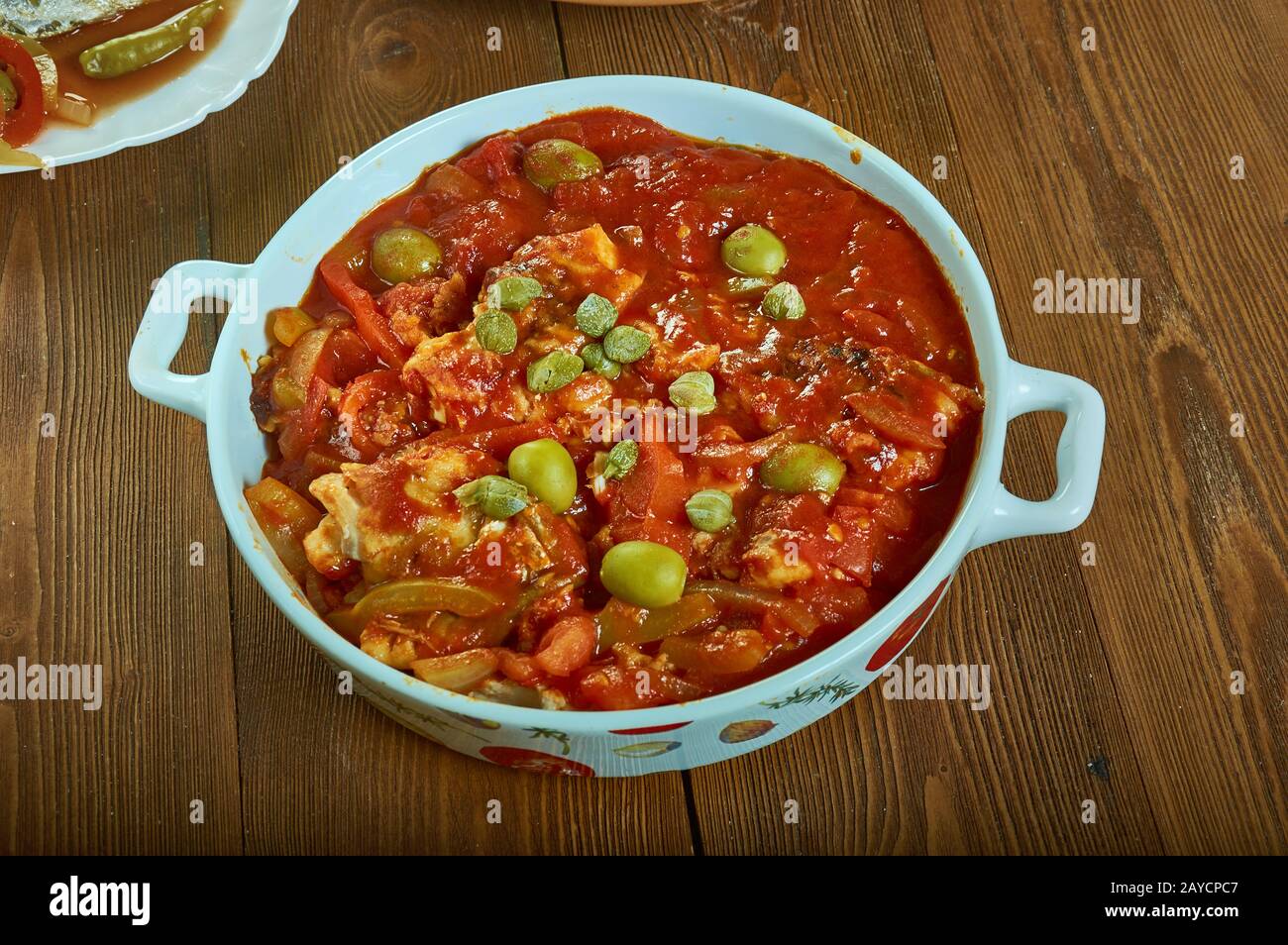 Mediterranean Baked Fish Recipe Stock Photo - Alamy