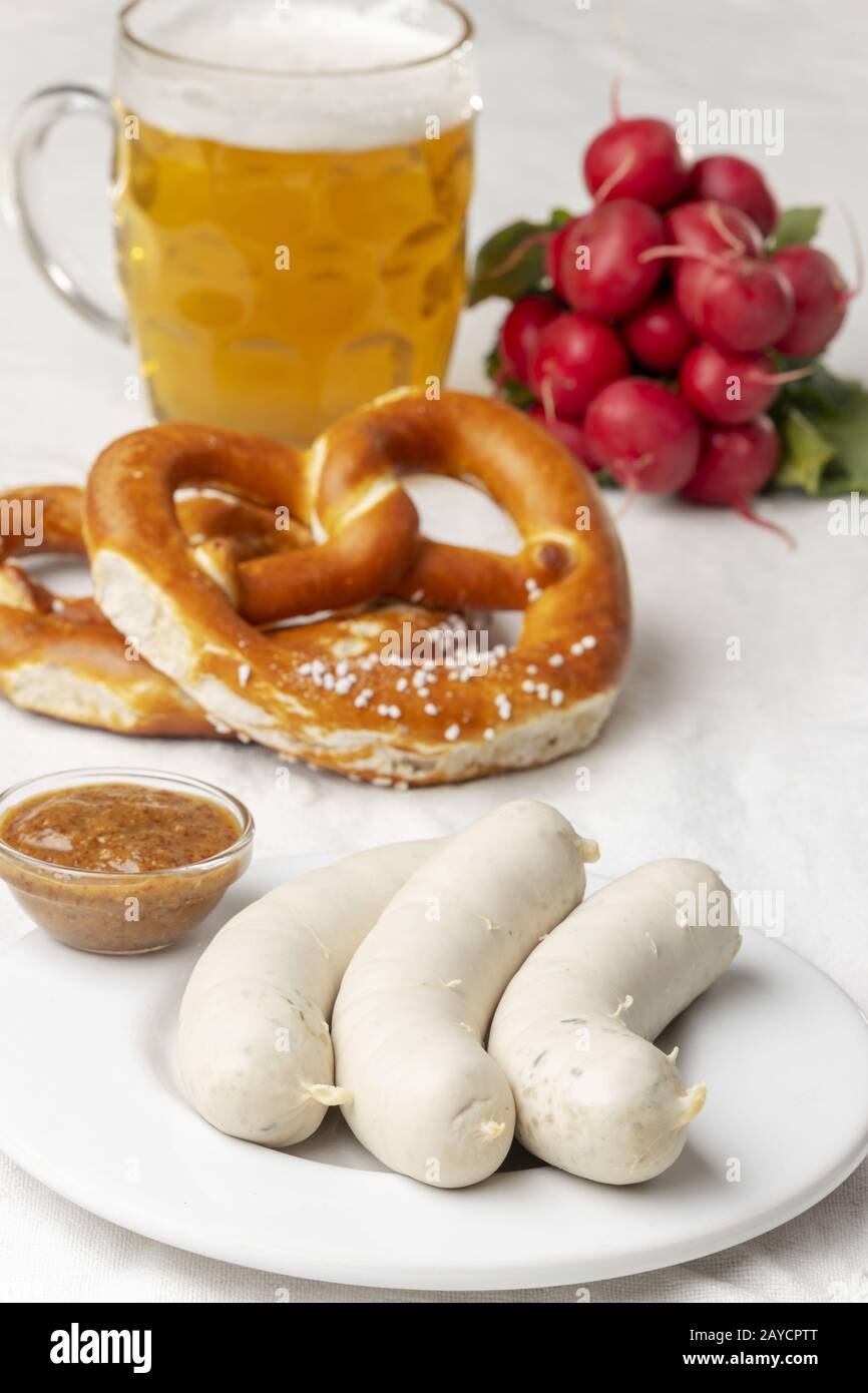 Bavarian veal sausage with pretzel Stock Photo Alamy