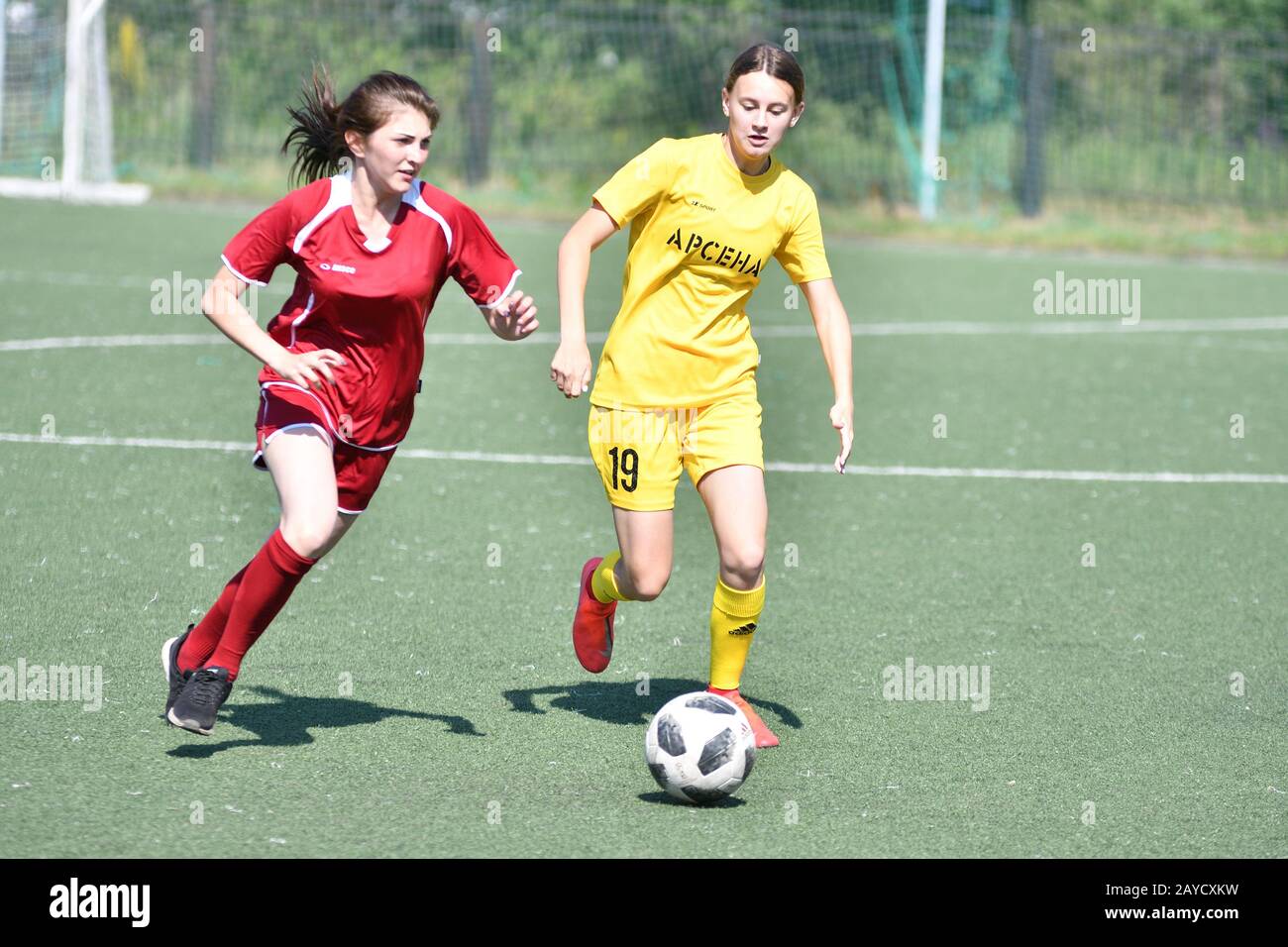Girl play football hires stock photography and images Alamy