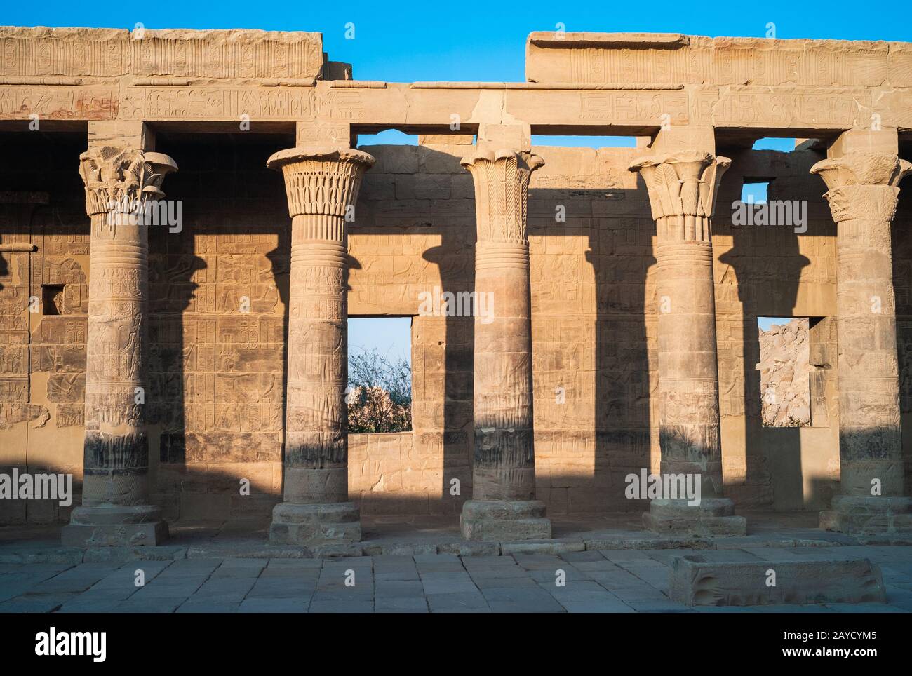 Ancient Egyptian Columns in the Temple of Isis from Philae - Western Colonnade, now on Agilika Island, near Aswan, Egypt Stock Photo
