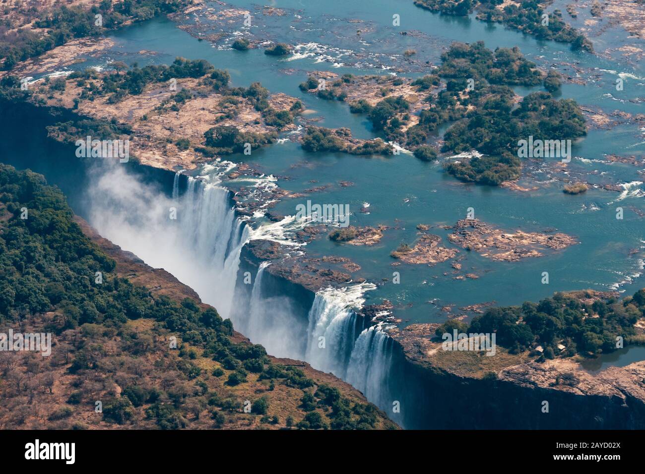 Victoria Falls Aerial View, Zambezi River Waterfall, between Zimbabwe and Zambia, Africa, a World Famous Tourist Attraction Stock Photo