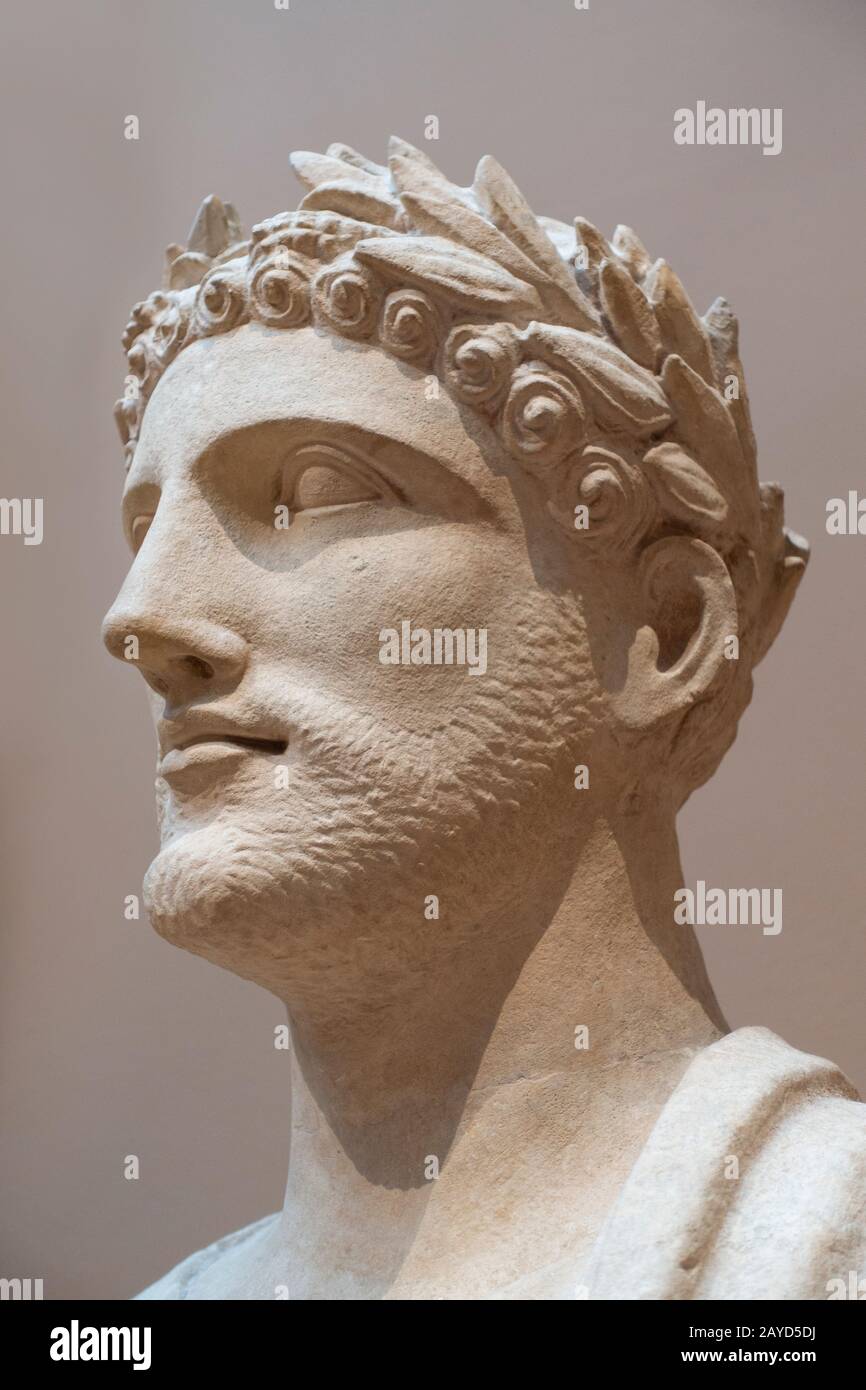 Manhattan, New York, USA, 03/28/2018, High clasical greek style limestone head statue with a Laurel wreath Stock Photo