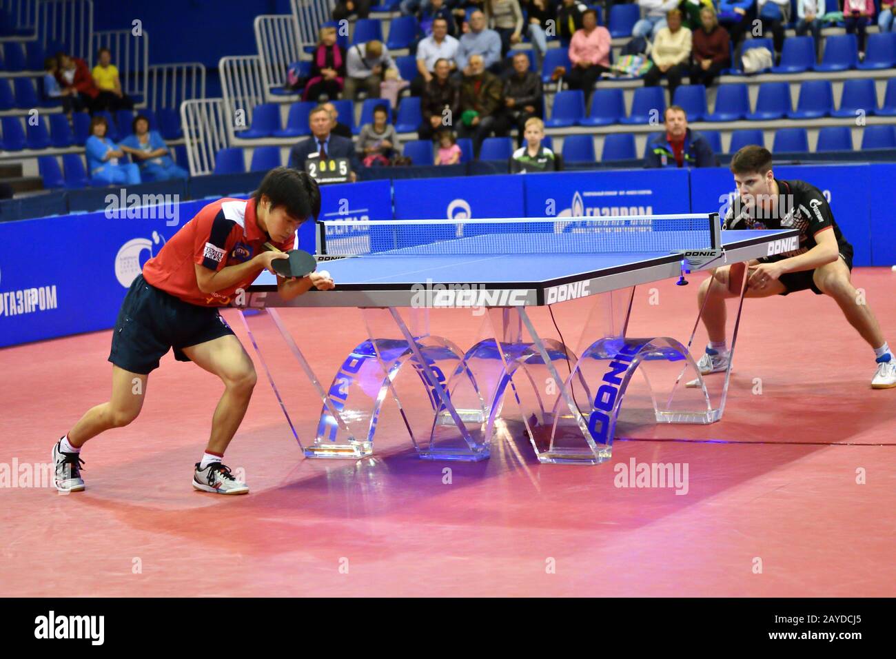 Orenburg, Russia - September 28, 2017: boy compete in the European Champions League match table tenn Stock Photo