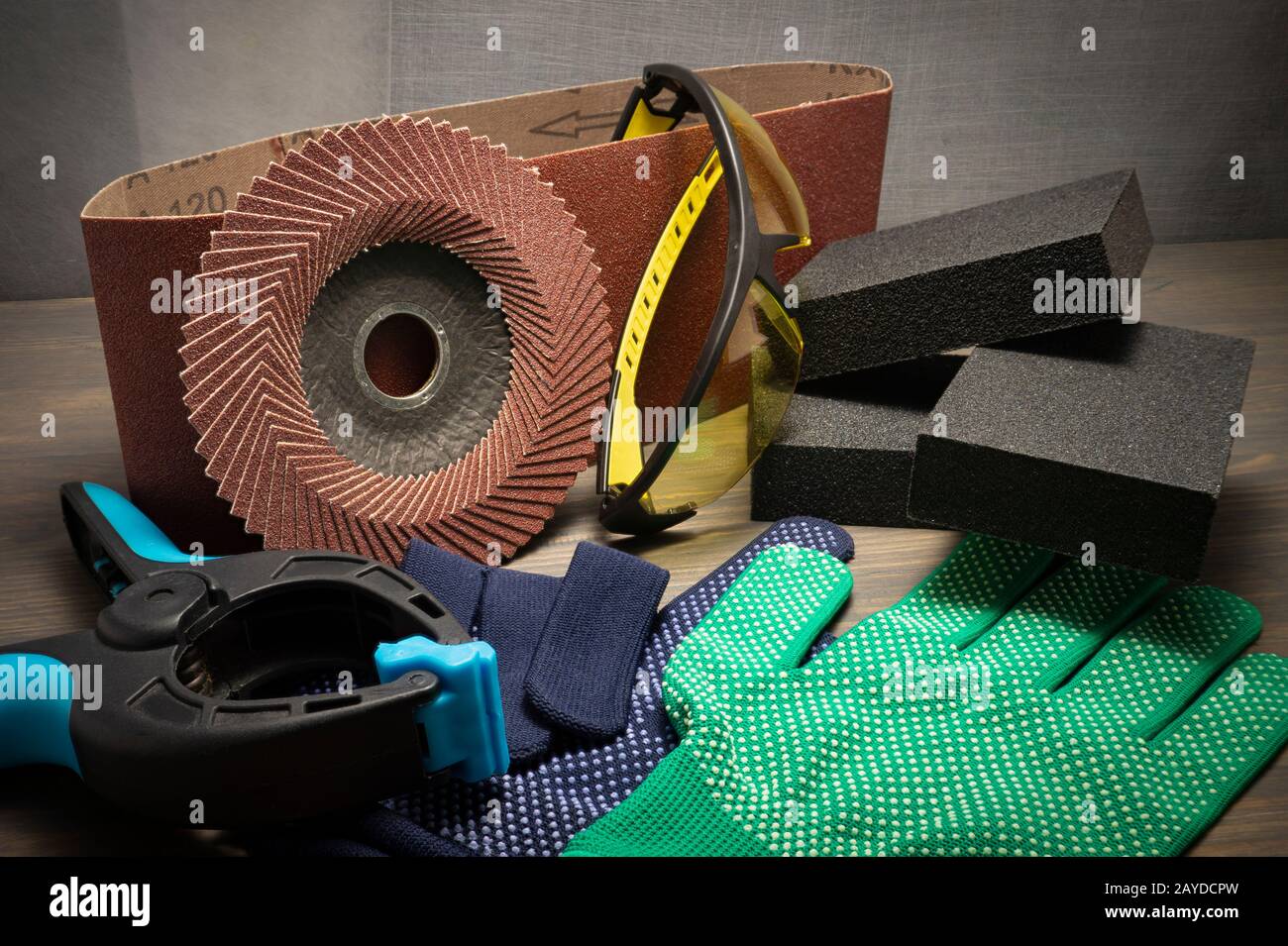 Different tools for sanding sanding belt, clamps, abrasive sponge and