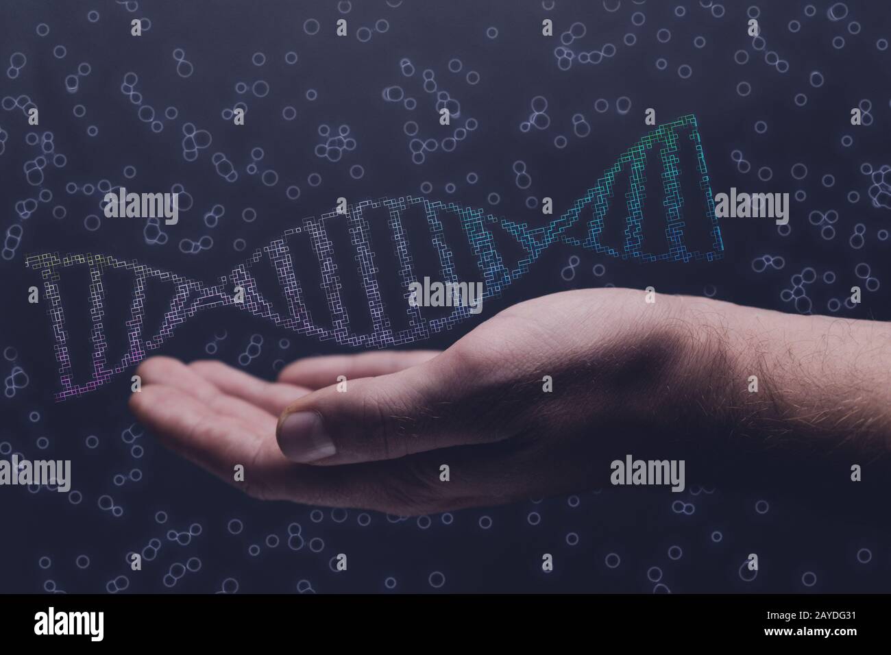 Man holding DNA molecule in palm Stock Photo - Alamy