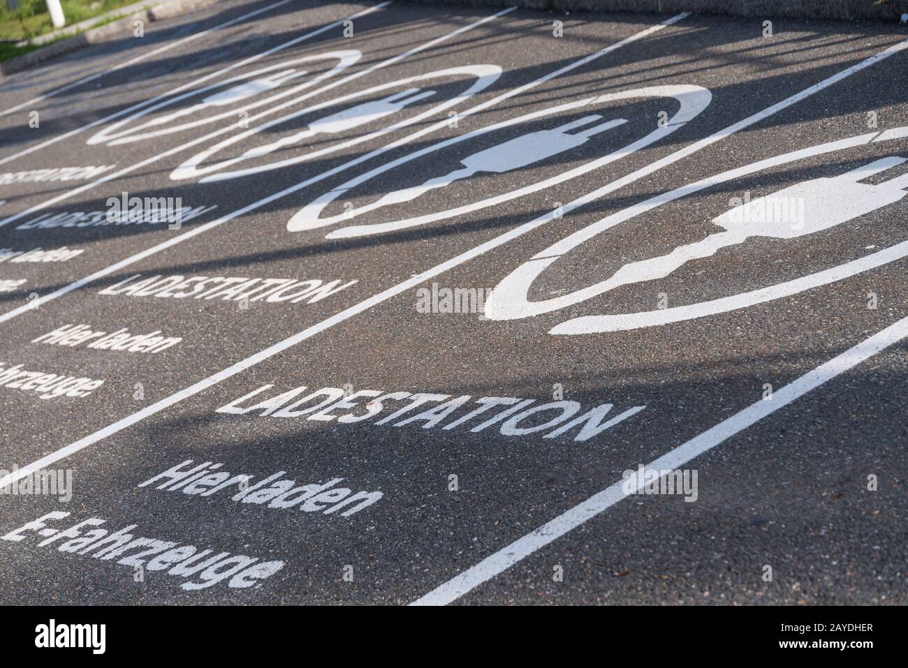 Parking for several electric cars and other electric vehicles - close-up Stock Photo