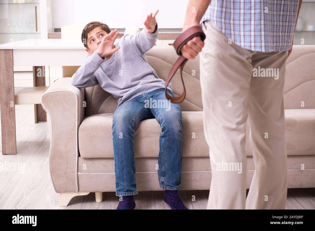 Father beating and punishing his sone Stock Photo - Alamy