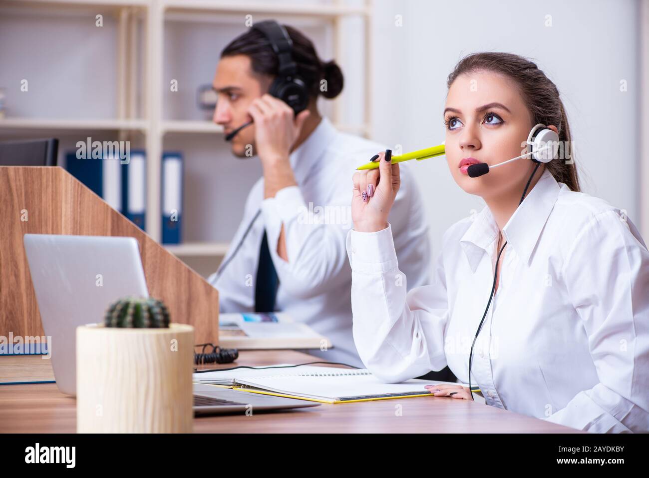 Call center agent writing notes hi-res stock photography and images - Alamy