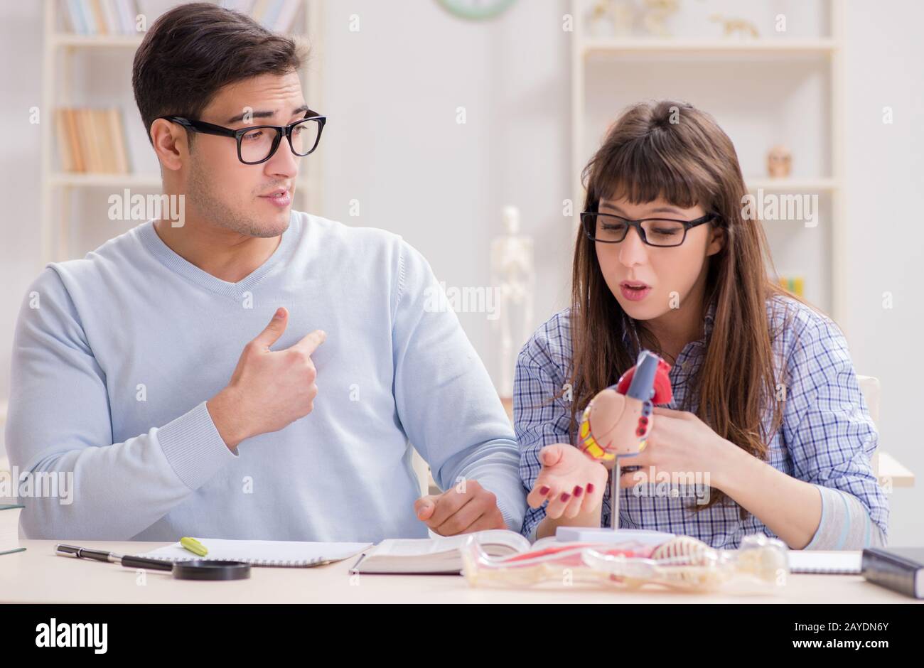 Two medical students studying in classroom Stock Photo Alamy