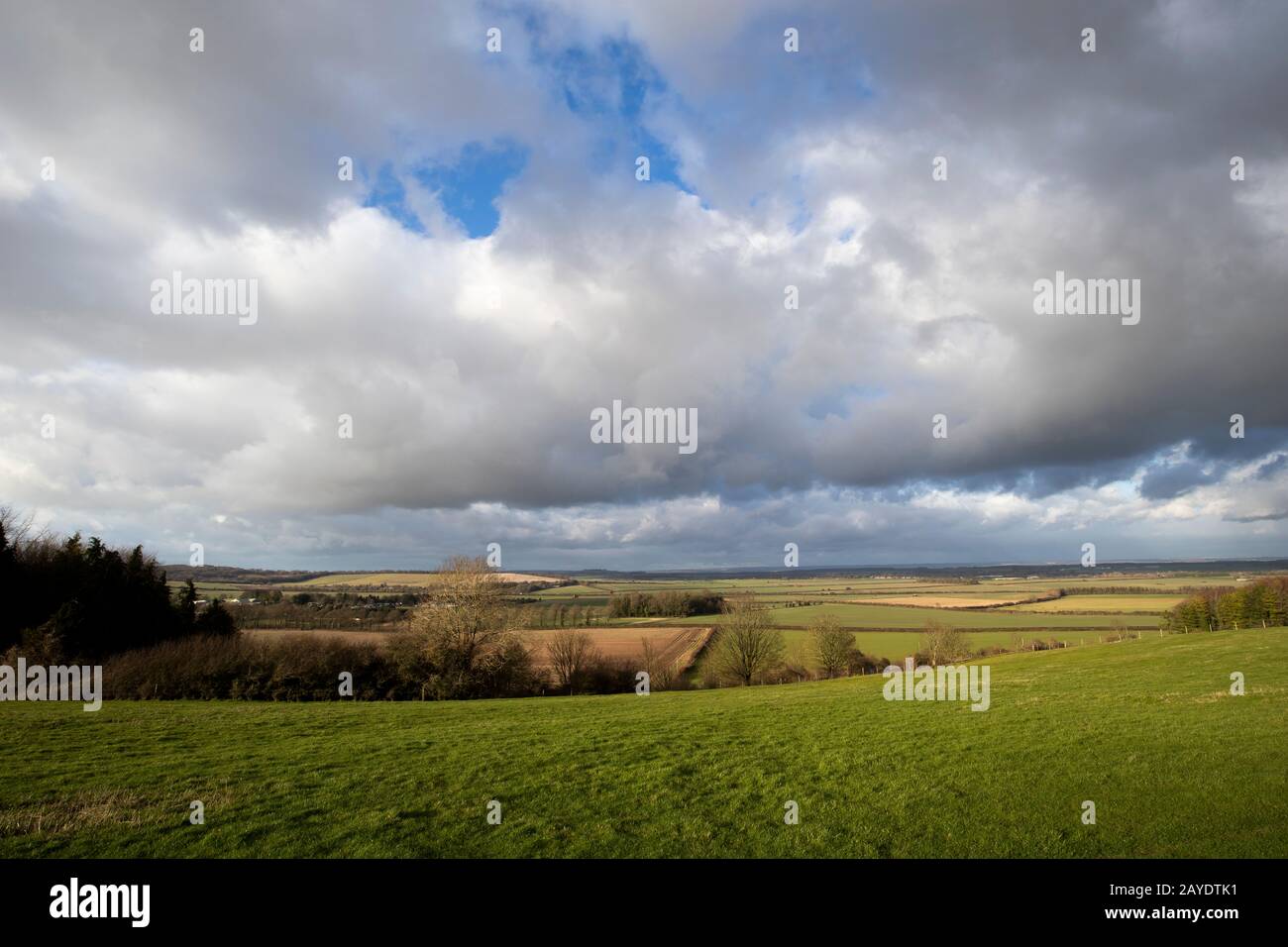 Rain clouds over farmland fields in the rural county of Hampshire Stock Photo