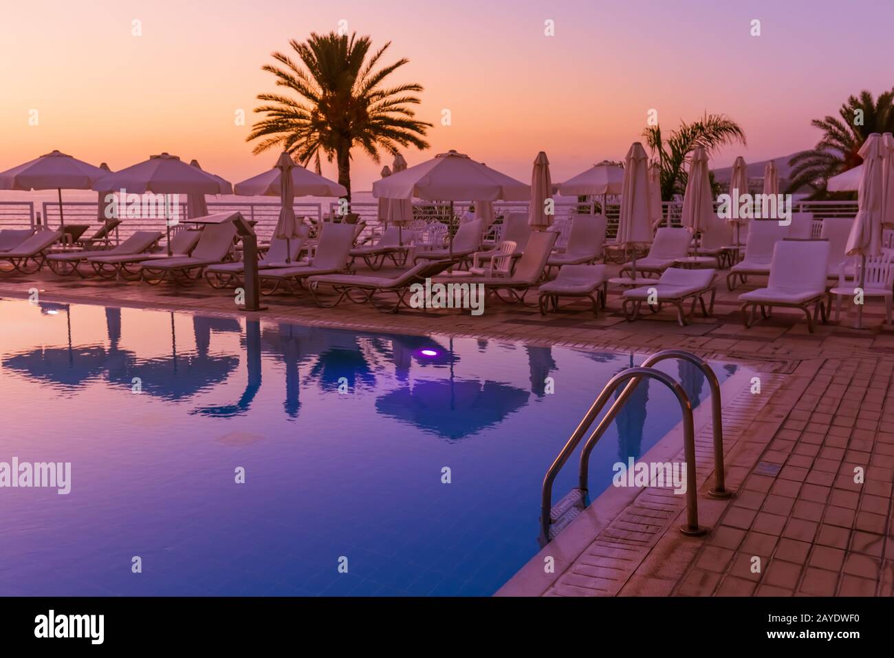 Swimming pool on Cyprus island at sunset Stock Photo Alamy
