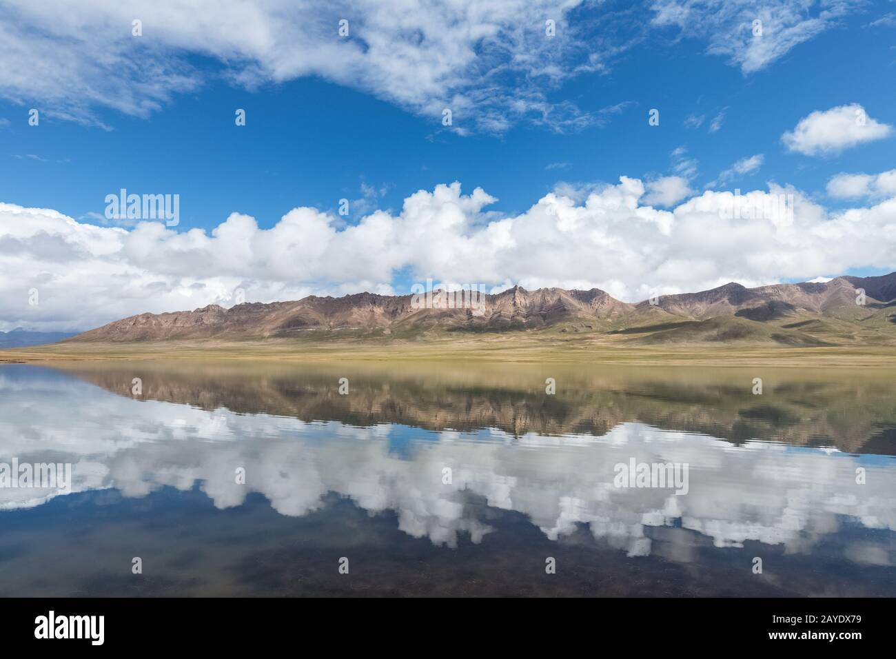 beautiful plateau lake and blue sky reflection Stock Photo