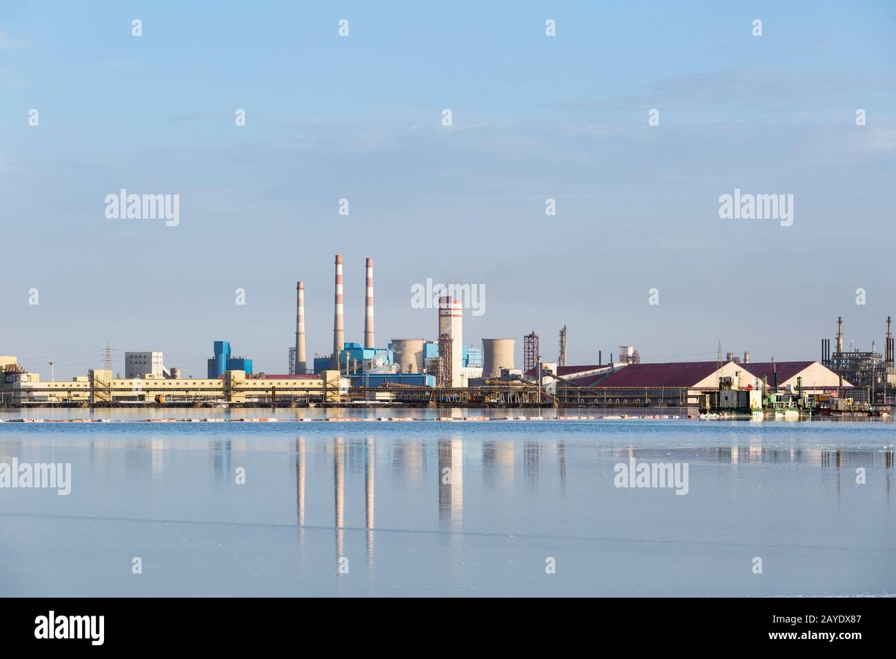 potash factory reflection in salt lake Stock Photo