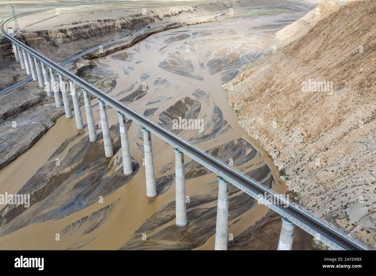 aerial view of railroad bridge on kunlun river Stock Photo