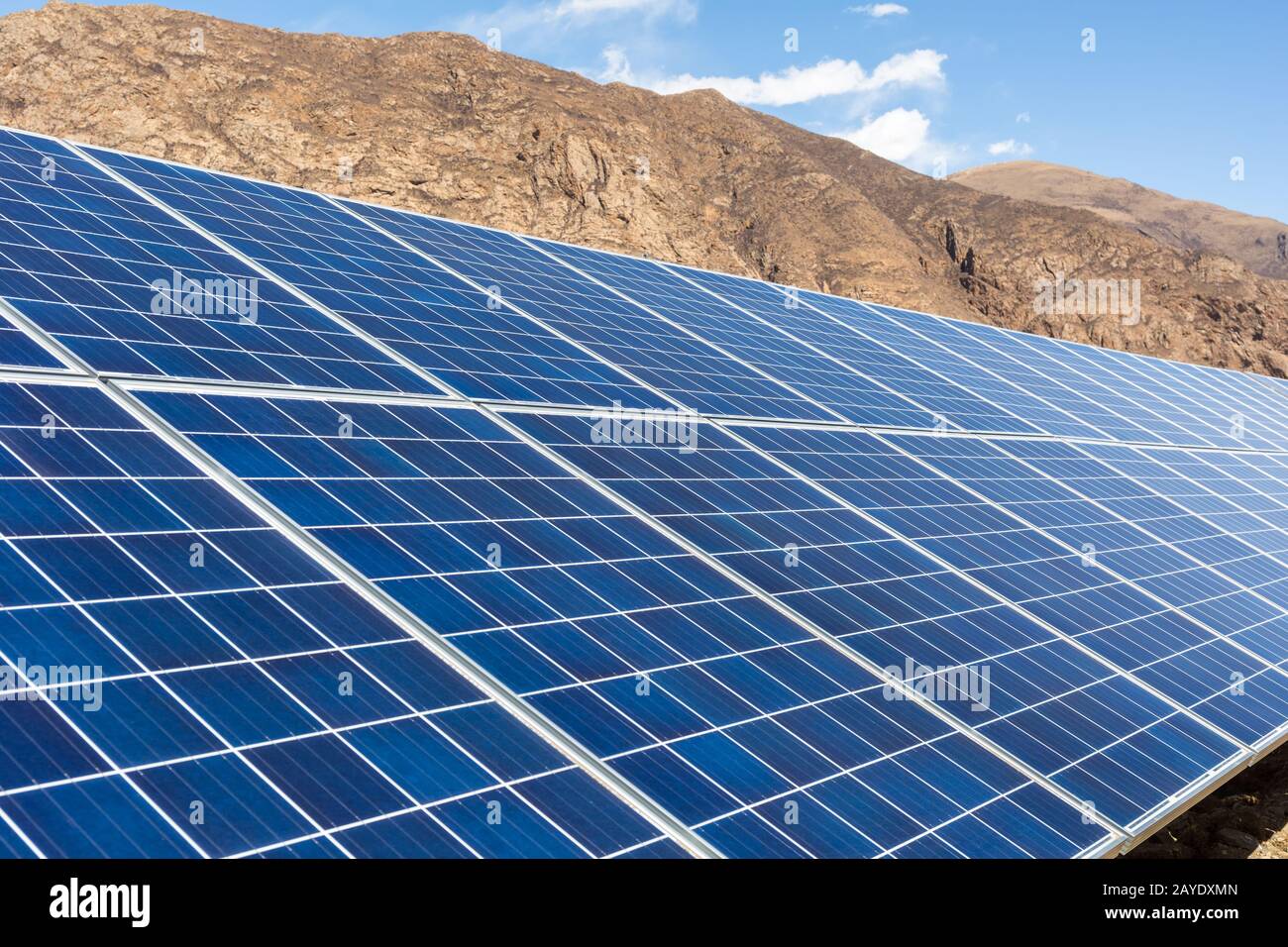 solar panels on barren mountain Stock Photo