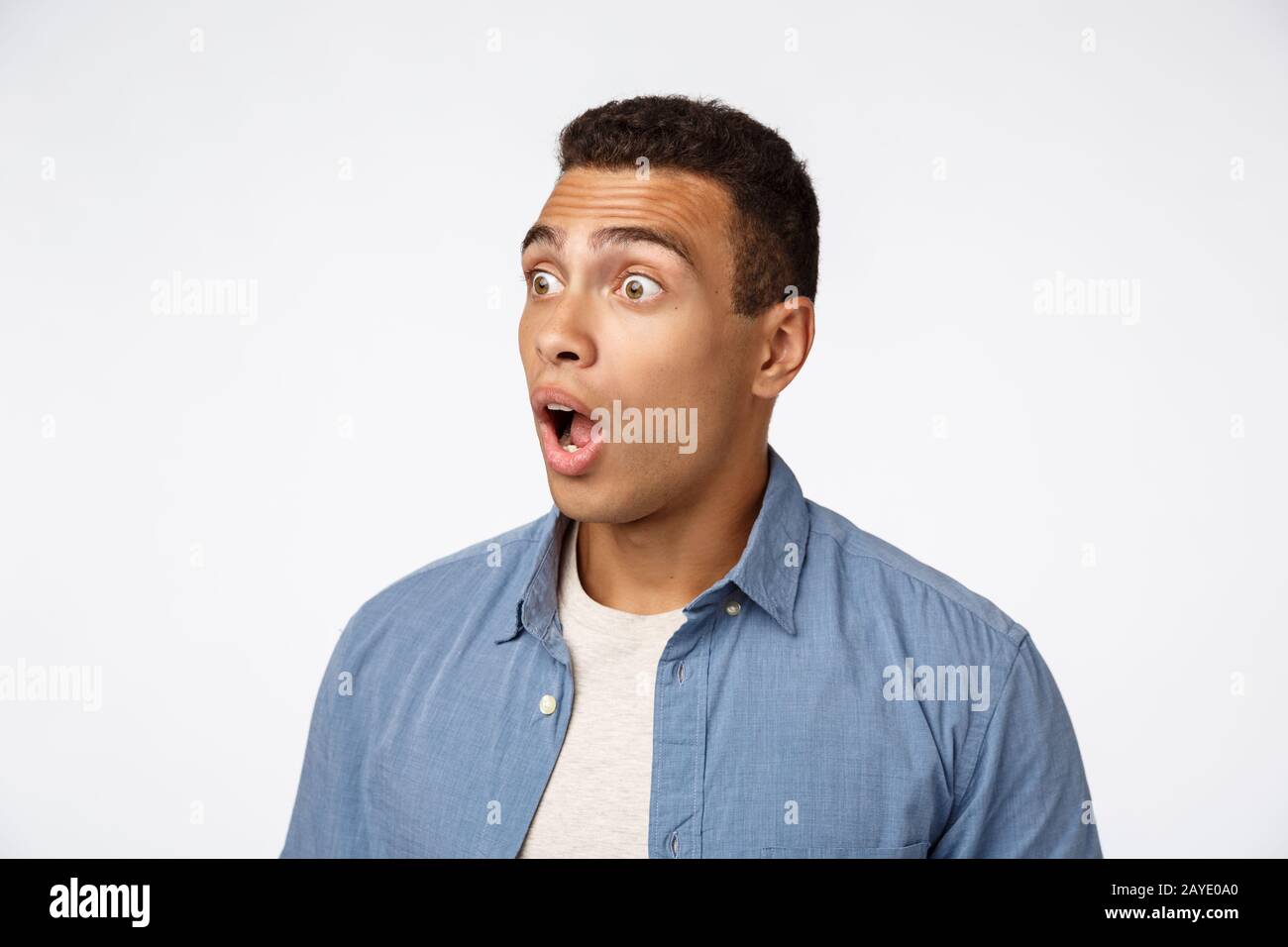 Shocked Amazed Young Wondered Guy With Short Haircut Drop Jaw Open