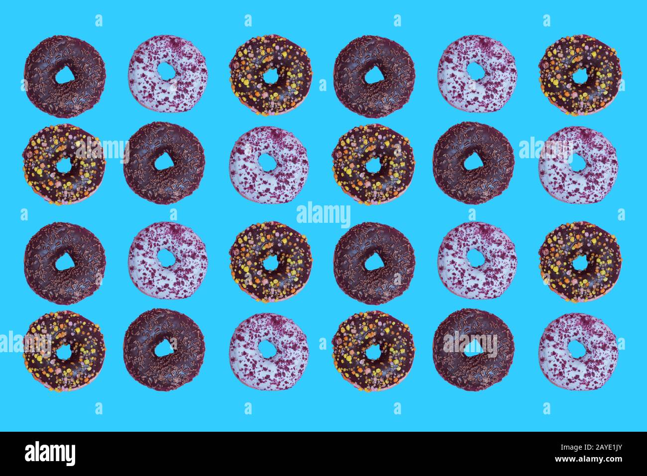 Top view to the donuts over blue background Stock Photo - Alamy