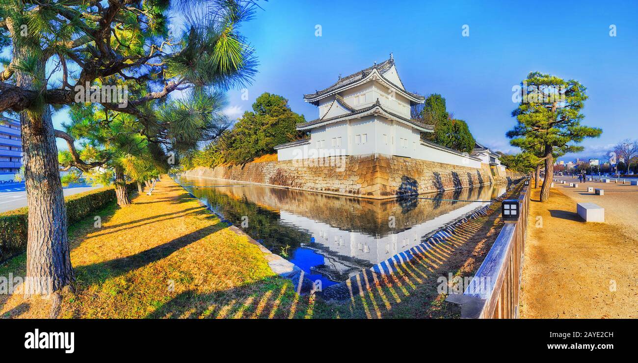 White corner tower of historic Nijo castle and park in Kyoto city of Japan on a sunny winter day. Stock Photo