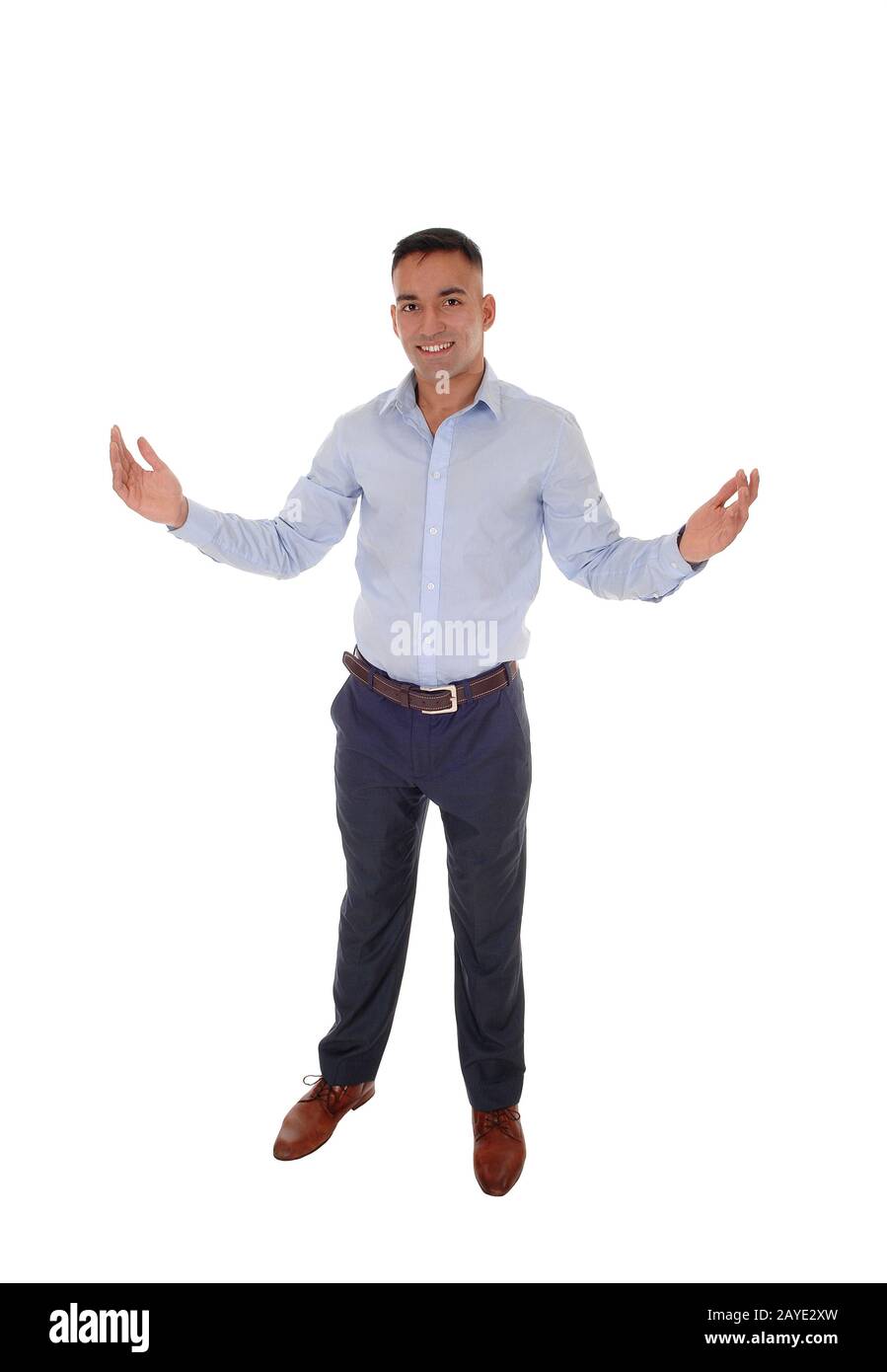 Young man standing with his arms open Stock Photo
