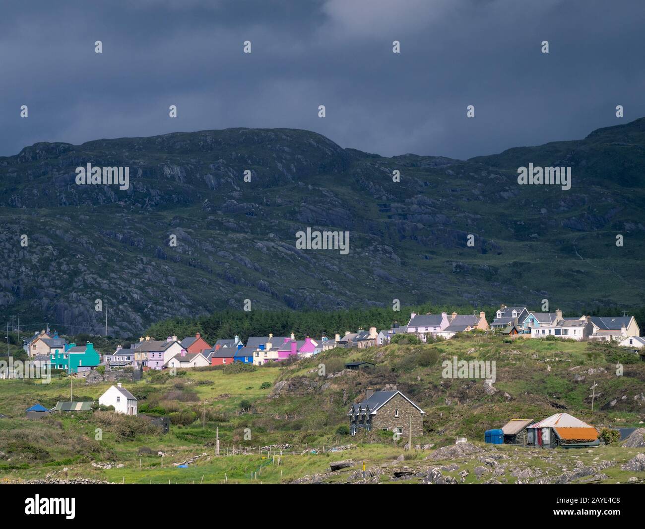 Painted houses of village eyeries on beara peninsula in ireland Stock