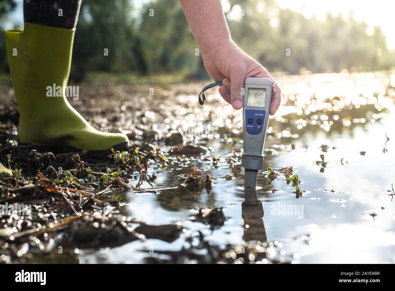 Measure water content with digital device. PH meter Stock Photo Alamy