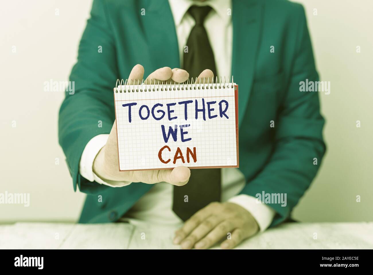 Conceptual hand writing showing Together We Can. Business photo text unity can makes everything possible One powerful group Man Stock Photo
