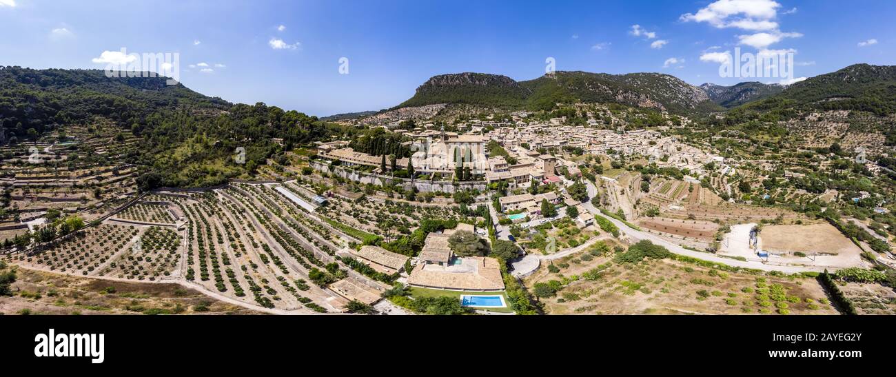Aerial view, village of Valldemossa with Charterhouse Sa Cartoixa and Tramuntana mountains, Spain, B Stock Photo