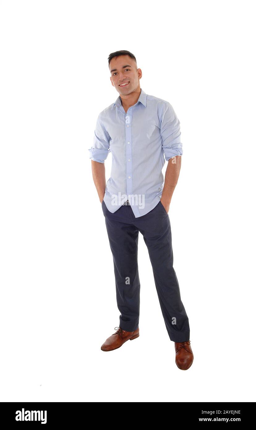 Young man standing with his hands in his pocket Stock Photo