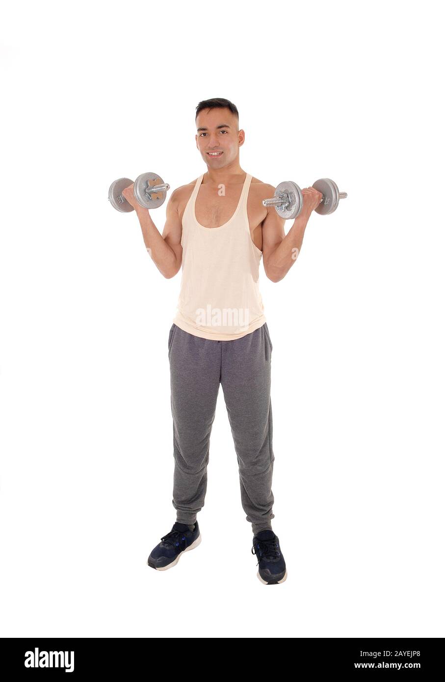 Full body image of a man with two dumbbells Stock Photo