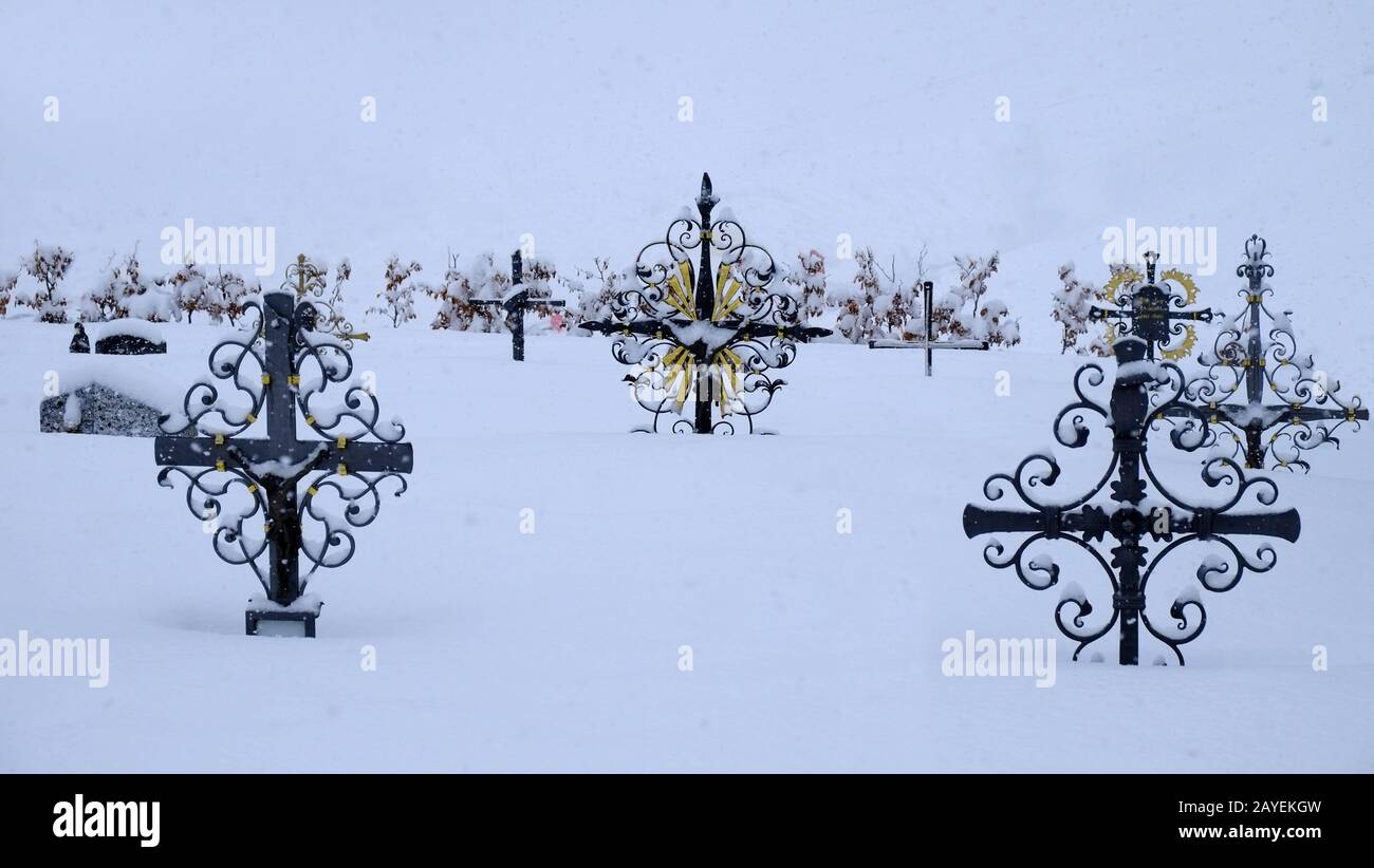 Snowbound grave crosses Stock Photo