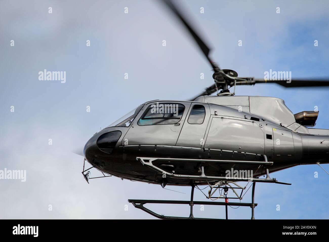 A cargo helicopter on the railway construction site Köthen, mast transport Stock Photo
