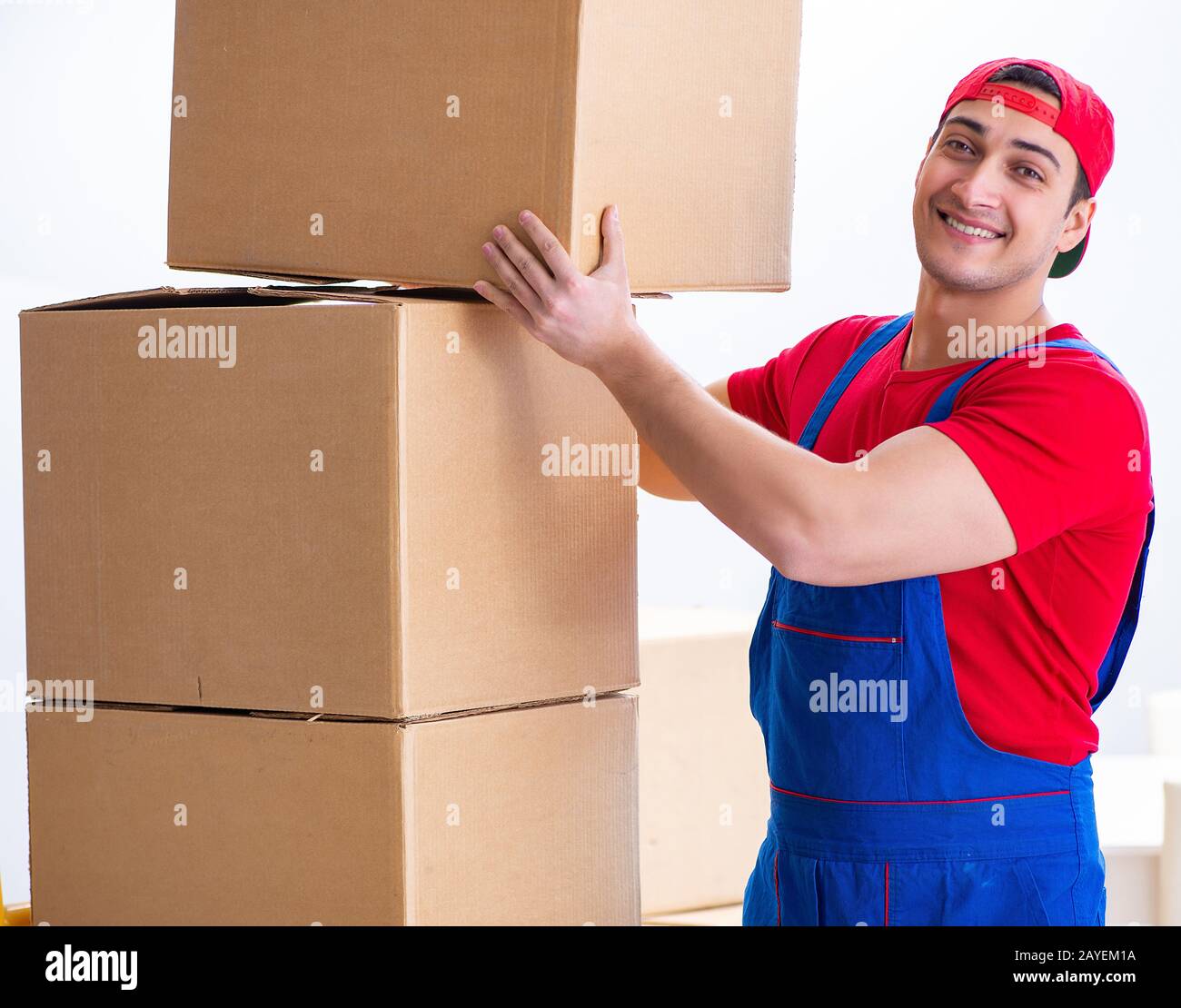 Contractor worker moving boxes during office move Stock Photo