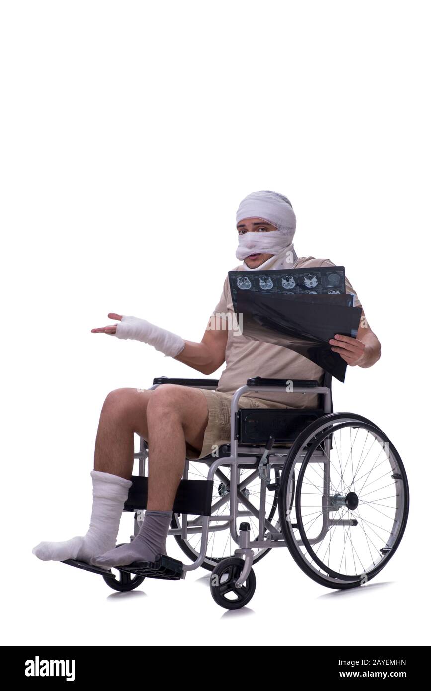 Injured man in wheel-chair isolated on white Stock Photo