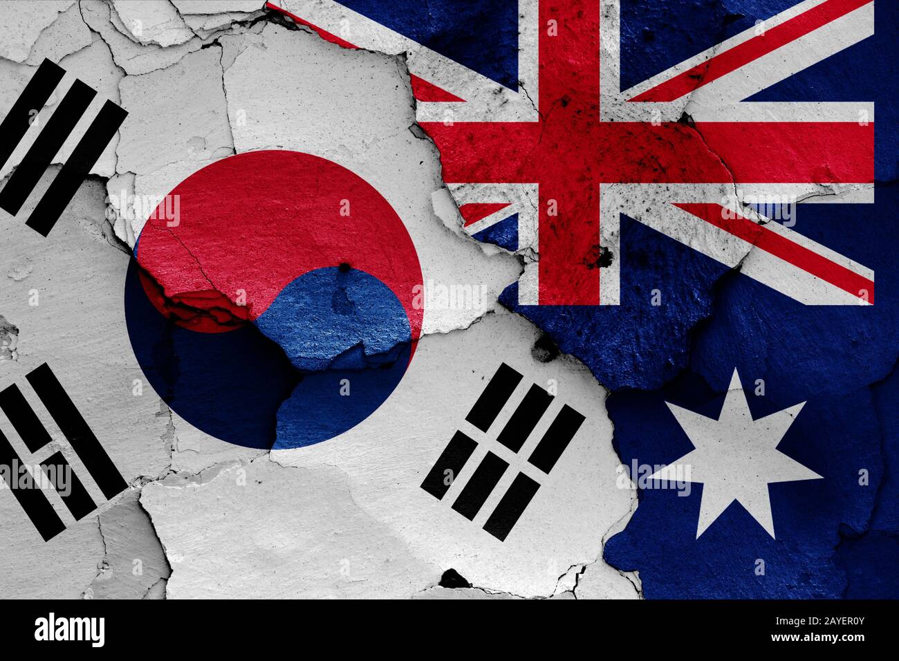flags of South Korea and Australia painted on cracked wall Stock Photo