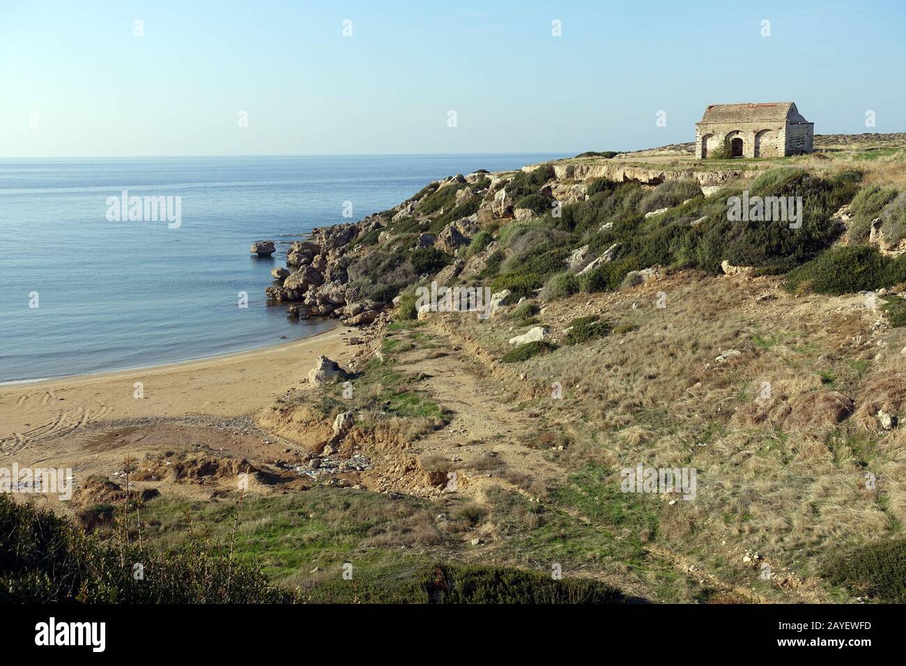 Desecrated church over a small beach at Kaplica (greek Davlos) Stock Photo