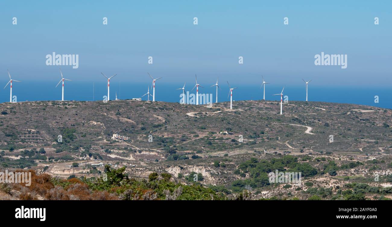 Wind turbines onshore on the south coast on the island of Kos Greece Stock Photo