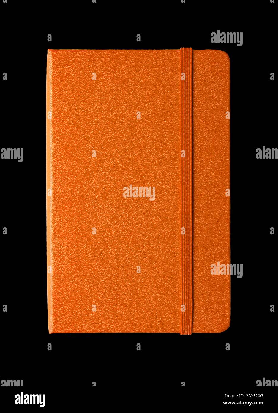 Orange closed notebook isolated on black Stock Photo