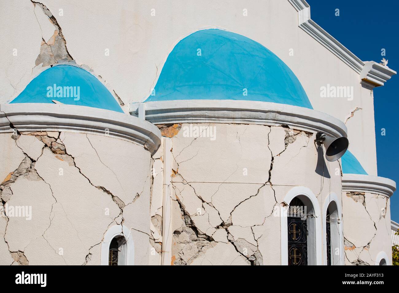 Blue white church in Kos city after an earthquake damaged Stock Photo